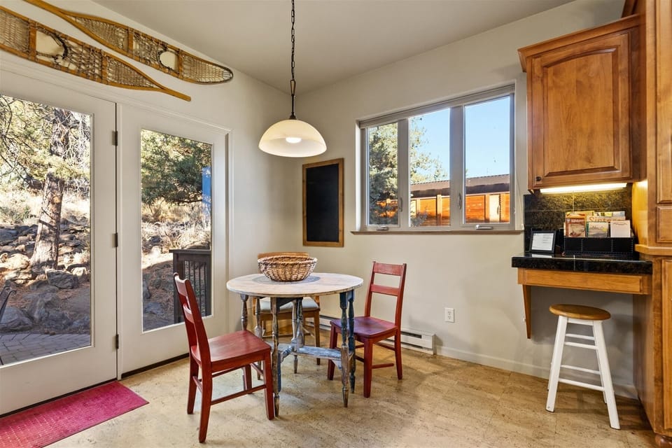Breakfast nook with views of the backyard.
