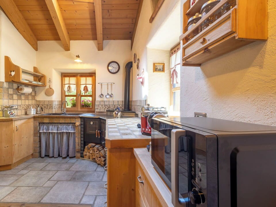 Kitchen, Wood, Countertop, Interior Design, Kitchen Appliance, Cabinetry, Furniture, Flooring, Major Appliance, Room