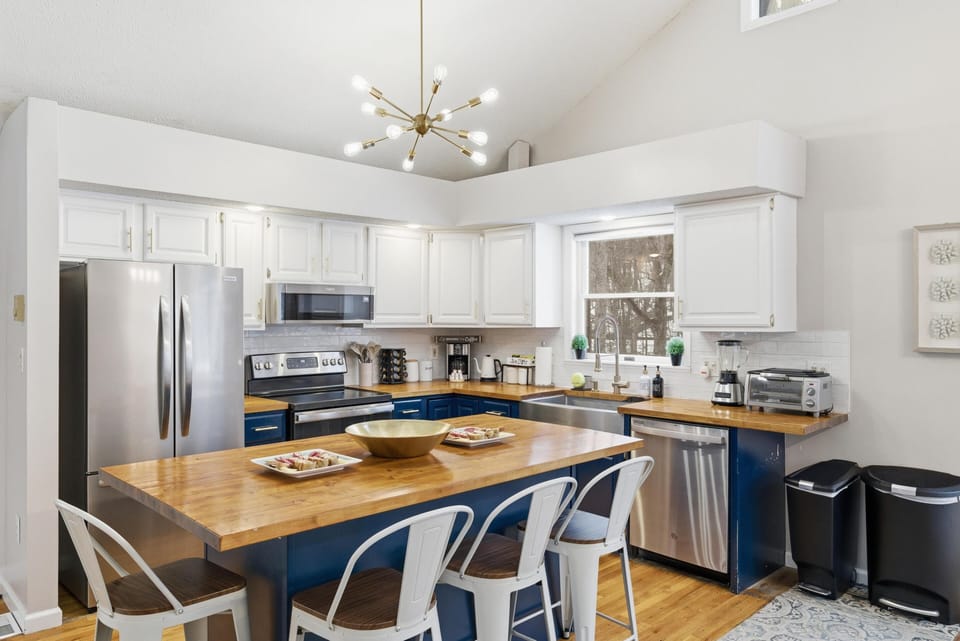 Cook in style, a fully stocked kitchen with all the essentials, a coffee station, blender, toaster oven, and plenty of counter space.