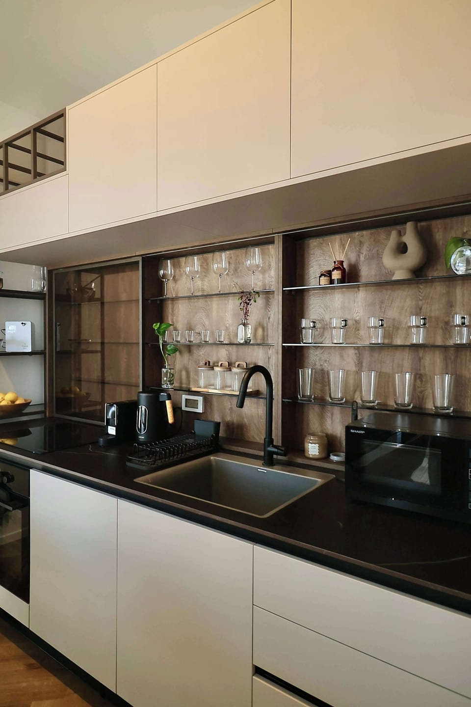 Dining table beside large windows, perfect for shared breakfasts before discovering restaurants and markets nearby.