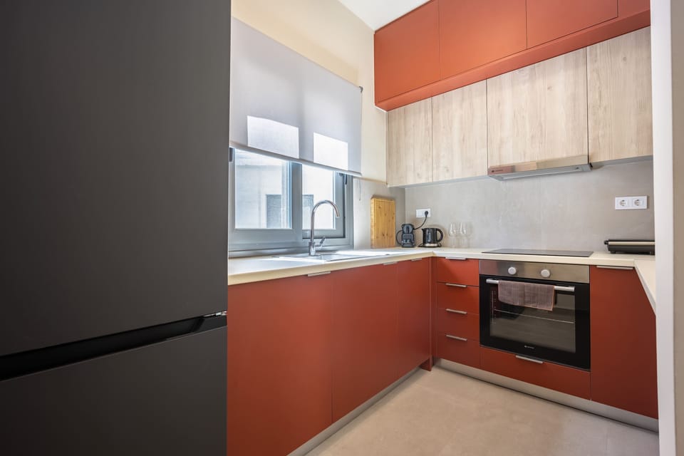 Cook effortlessly in the stylish kitchen, perfectly equipped for cozy dinners and leisurely breakfasts indoors.