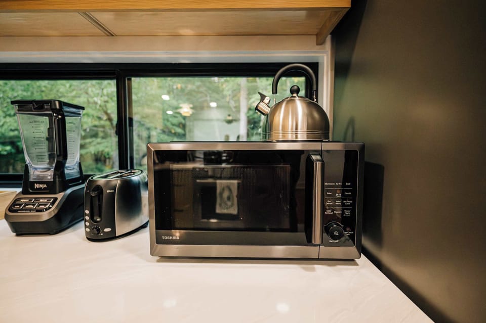 Small details throughout the kitchen create a comfortable and well-equipped cooking experience.