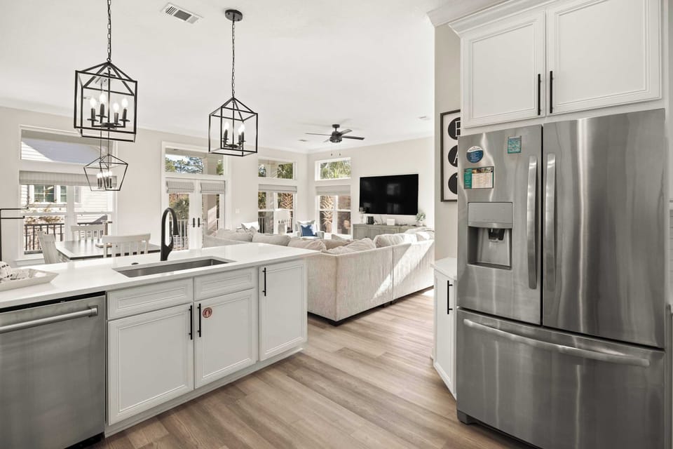 Kitchen: Keurig coffee machine, blender, cooking utensils, tableware