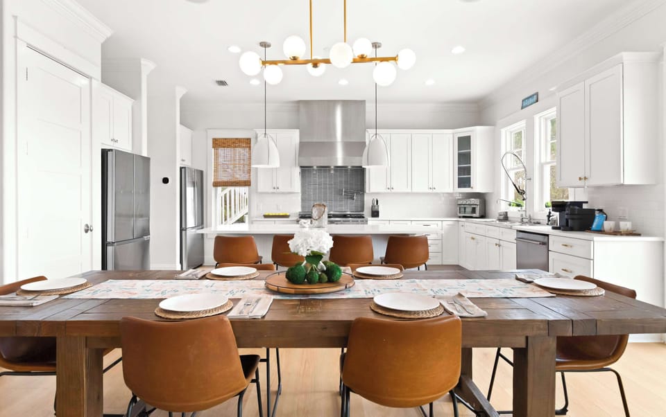 Dining area: Table seating for 6, breakfast bar with 4 stools