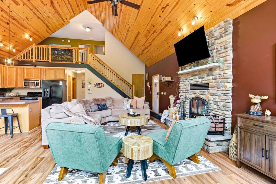 Beautifully designed main living area offering rustic charm, open sightlines, and a comfortable gathering space.