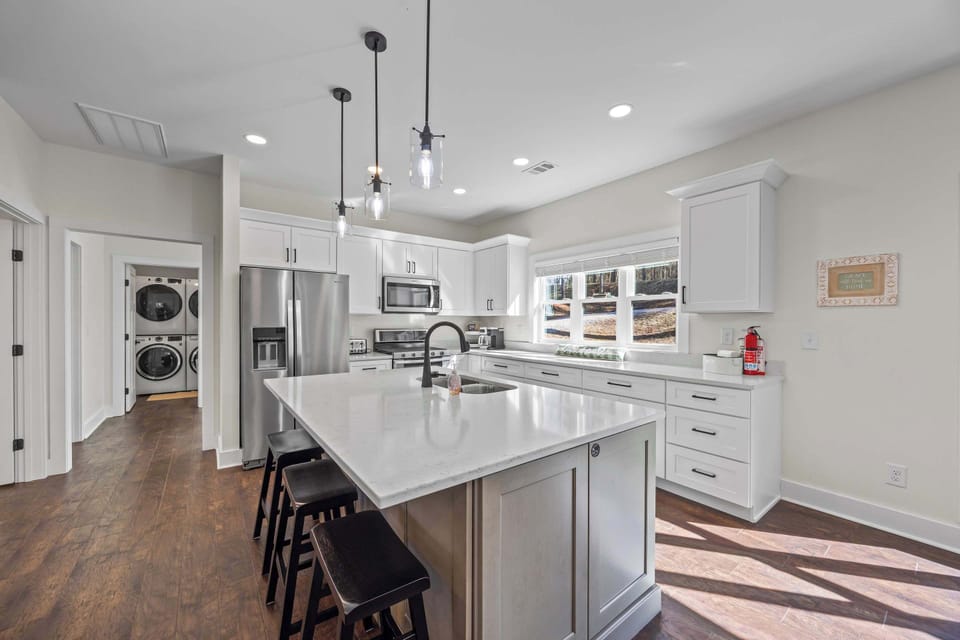Stunning, open concept kitchen on the main level of the home. 