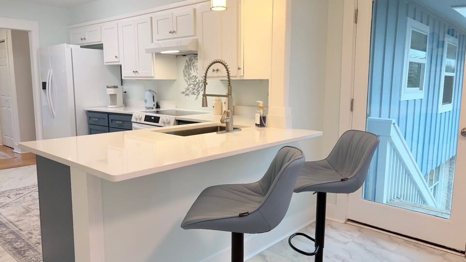 Updated kitchen with peninsula seating