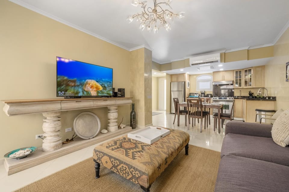 Spacious living area blending comfort and island-style charm.