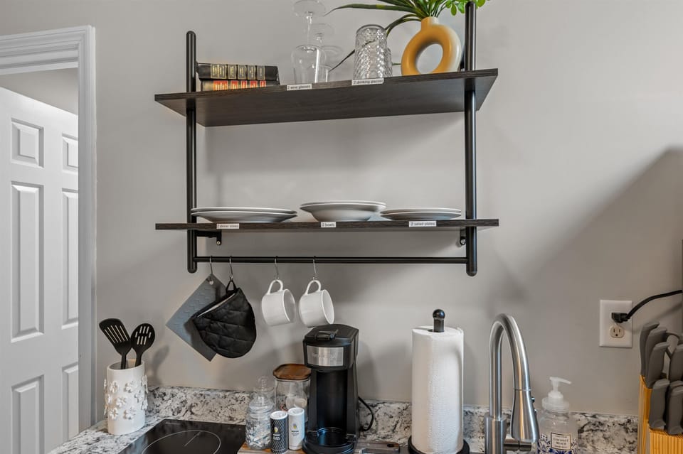 Coffee station, paper towels, and utensils 