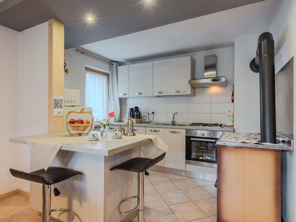 Furniture, Kitchen, Interior Design, Kitchen Appliance, Countertop, Flooring, Wood, Major Appliance, Cabinetry, Ceiling