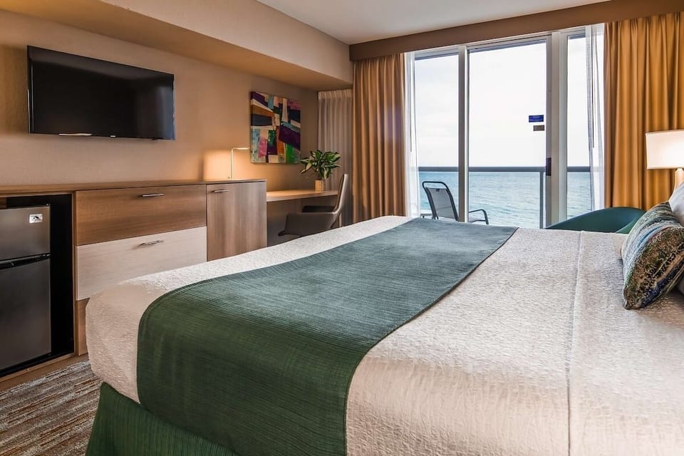 Linger longer with balcony views steps from your bed.