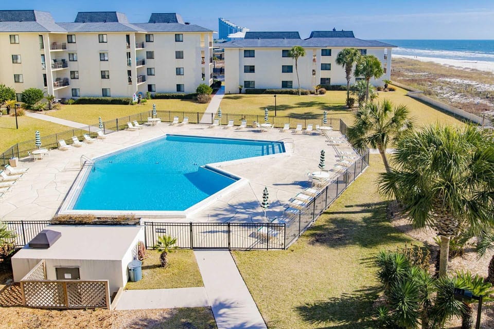Resort-style pool with ocean views and spacious sun deck