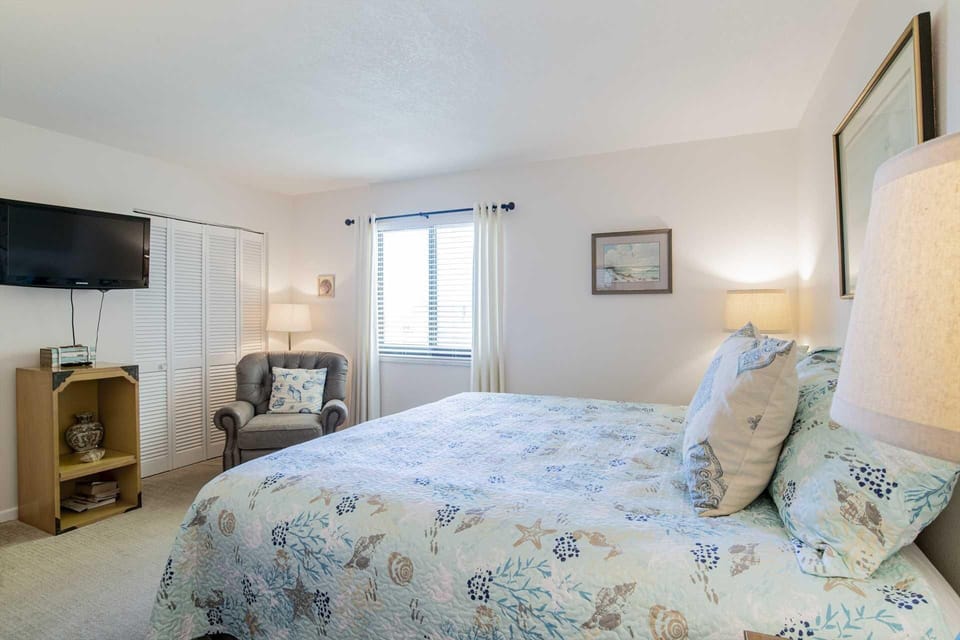 Cozy bedroom retreat with soft natural light and calming decor