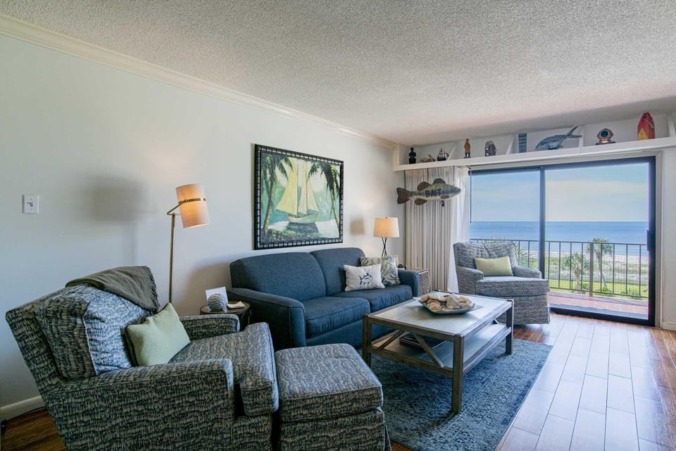 Cozy living room with stunning ocean views and natural light