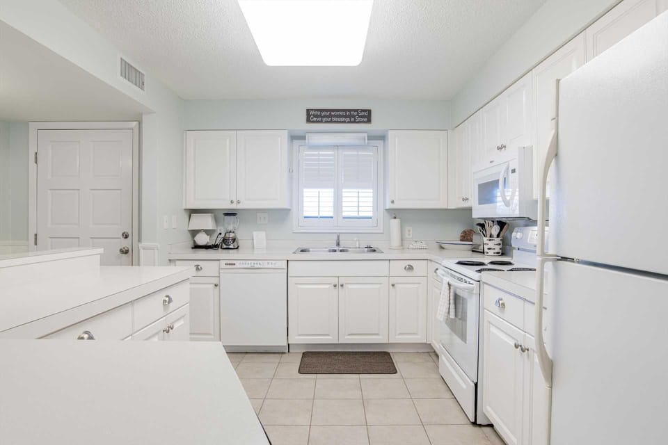 Bright, airy kitchen with ample counter space and modern appliances