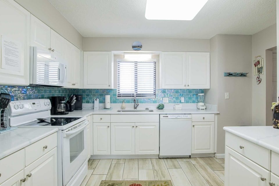Bright, airy kitchen with modern appliances