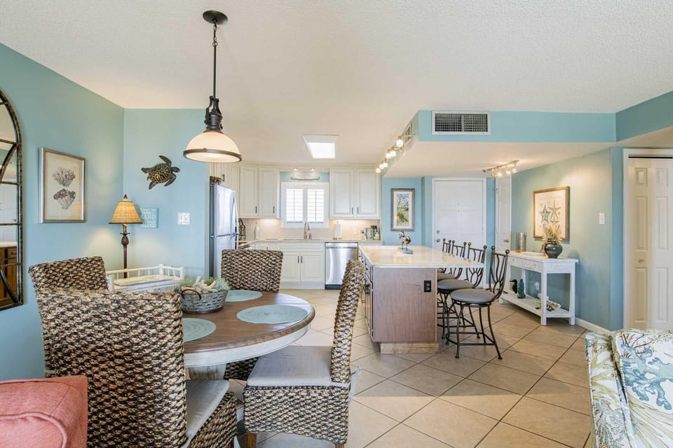 Spacious open-concept living and dining area with coastal charm
