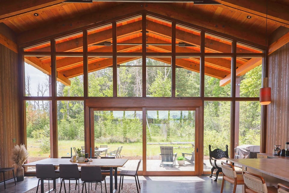 Dining beneath the vaulted timber ceiling