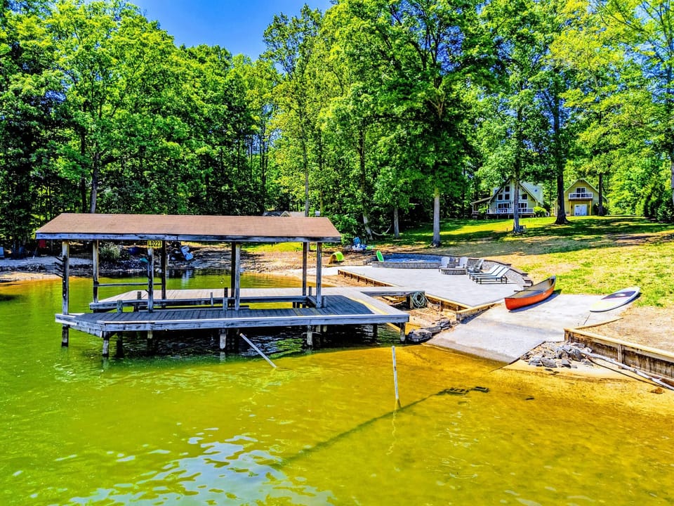 Dock - Easy access to the water from a generous dock built for lazy afternoons and sunset swims.