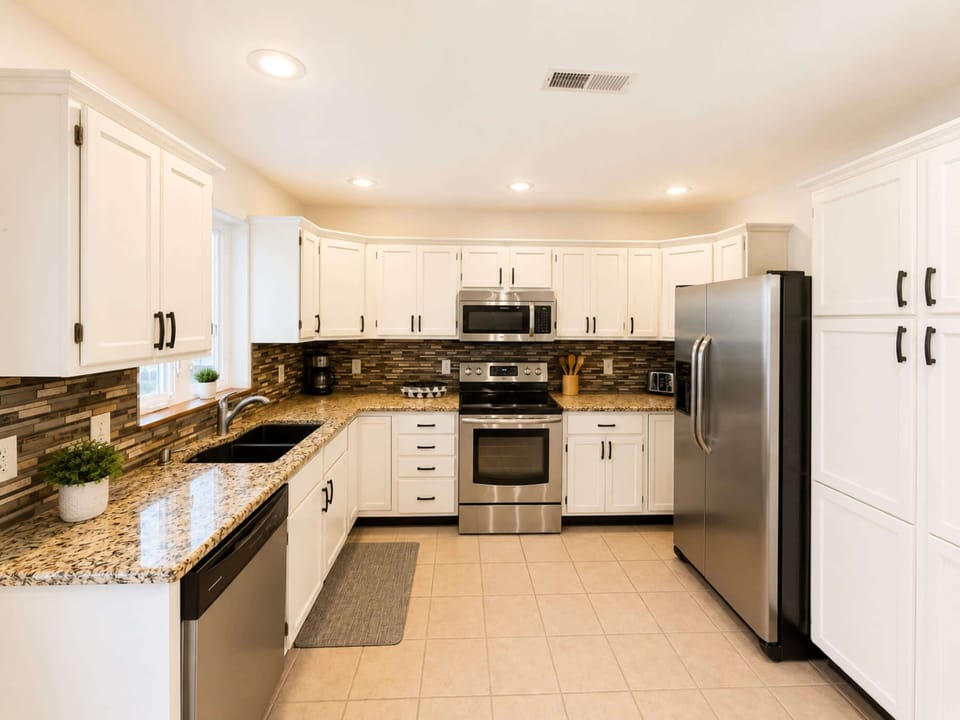 The open kitchen is well equipped for an unforgettable getaway​