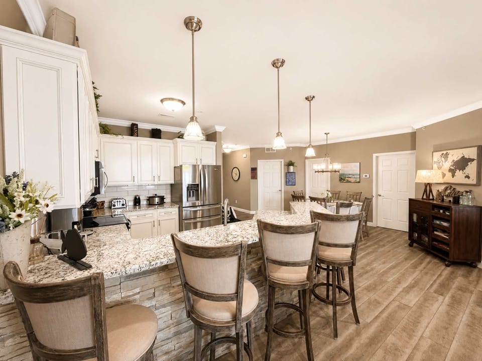 The chic, open kitchen is well equipped for an unforgettable getaway​