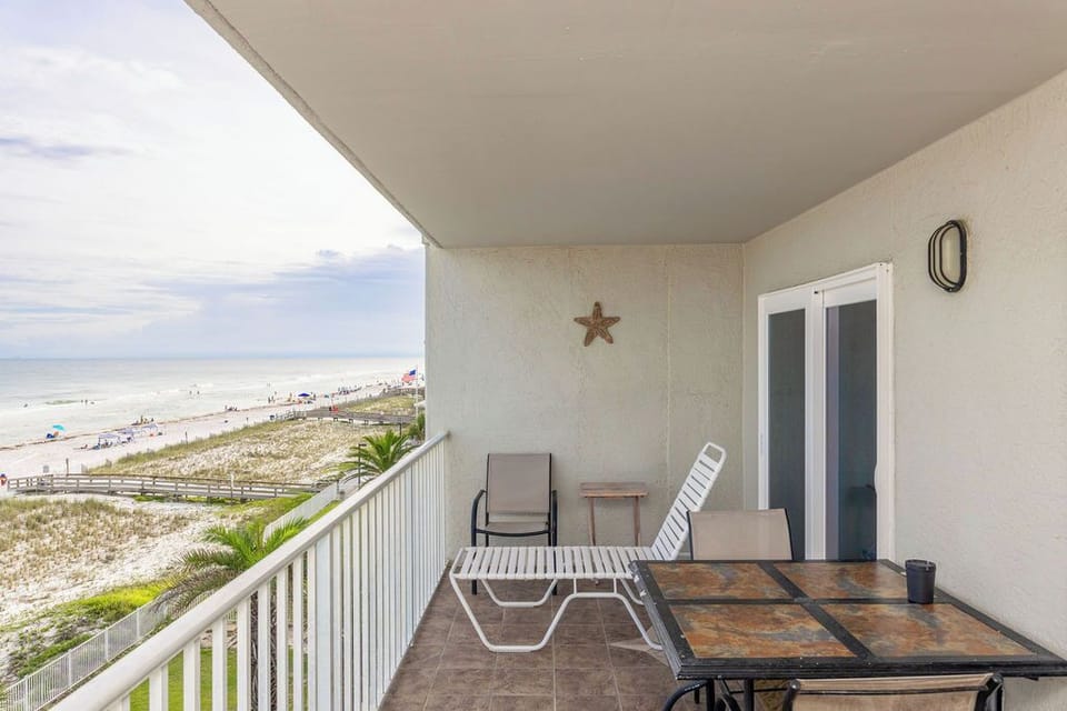 Balcony with table and seating