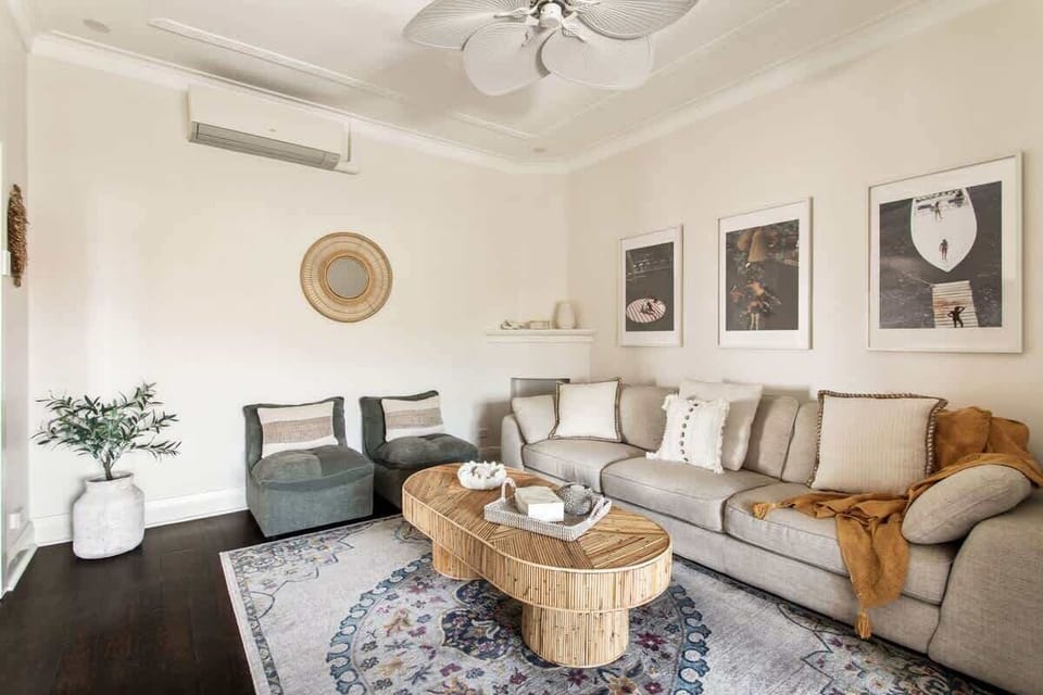 Living Room: Stylish space with vibrant decor, perfect for relaxing after beach days!
