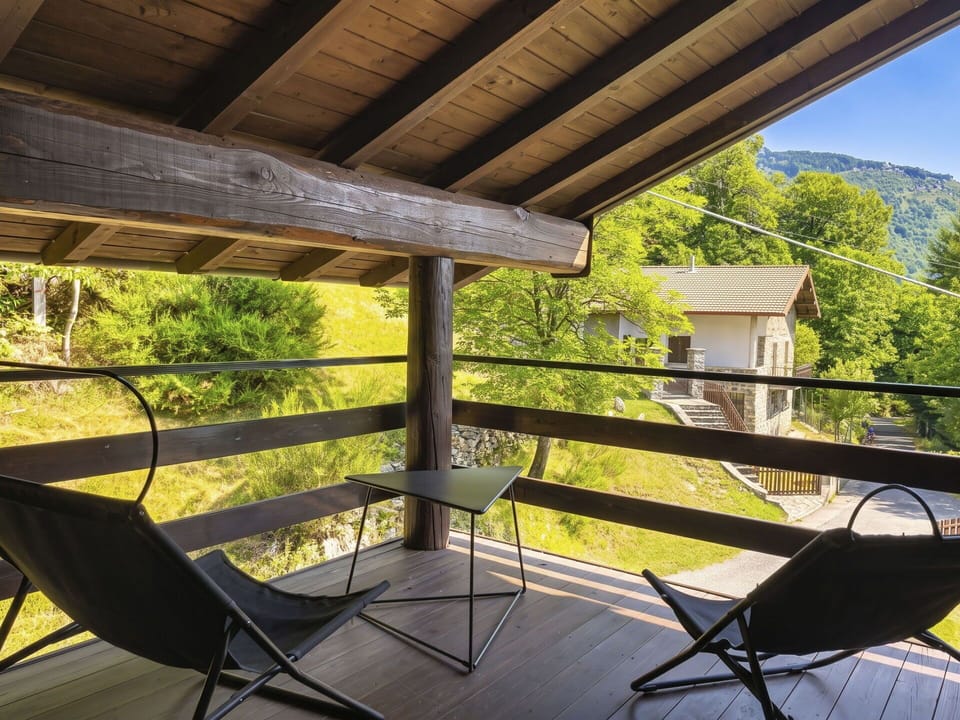 Wood, Hardwood, Porch, Wood Stain, Plank, Ceiling, Shade, Cottage, Chair, Natural Material