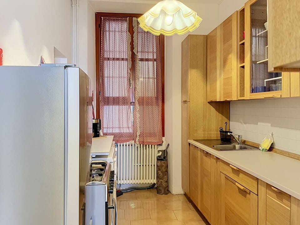 Kitchen, Kitchen Appliance, Countertop, Cabinetry, Major Appliance, Wood, Furniture, Interior Design, Flooring, Cupboard