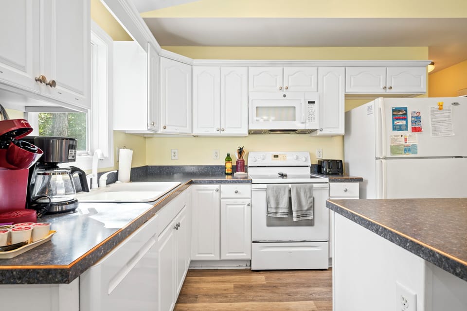 Your fully equipped kitchen awaits with everything needed to prepare memorable meals during your stay.