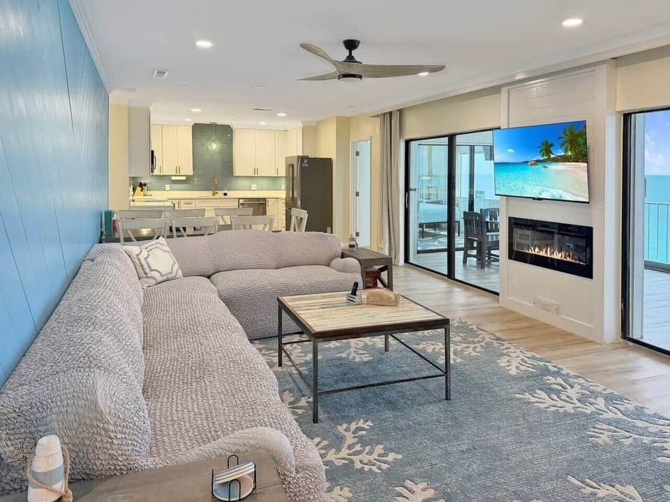 Living room; fireplace, sliders to balcony