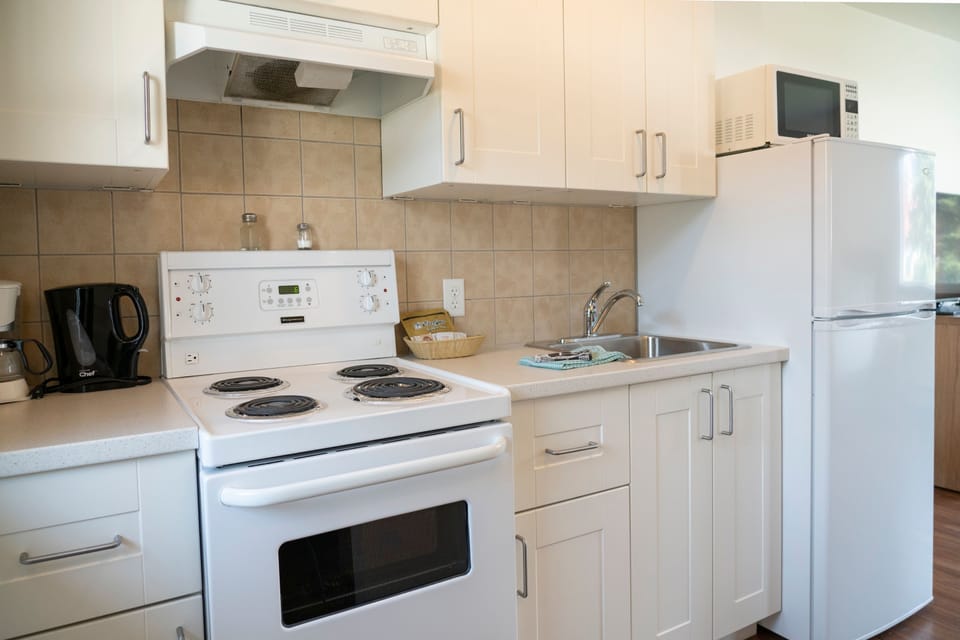 Cook your favourite meals in the full kitchen, equipped with modern appliances and essential cookware