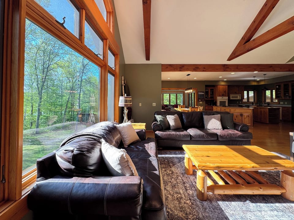 Relax indoors while nature surrounds you outside every window.