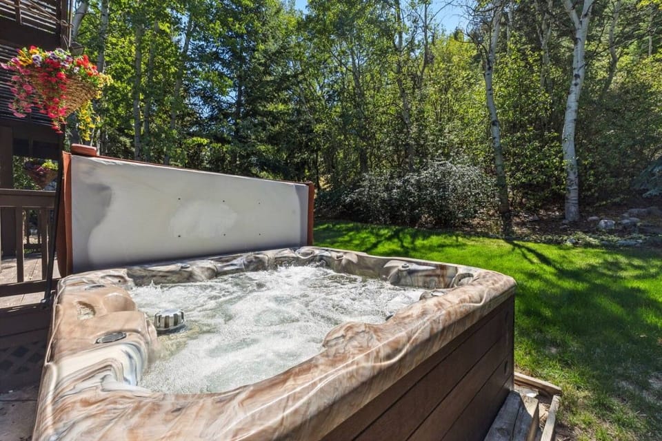 Private hot tub overlooking the trees