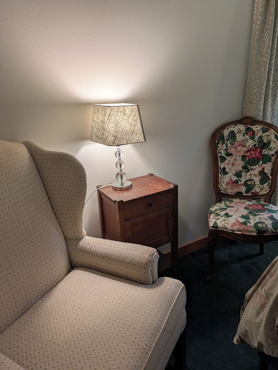 A cozy reading nook in the separate bedroom with king bed