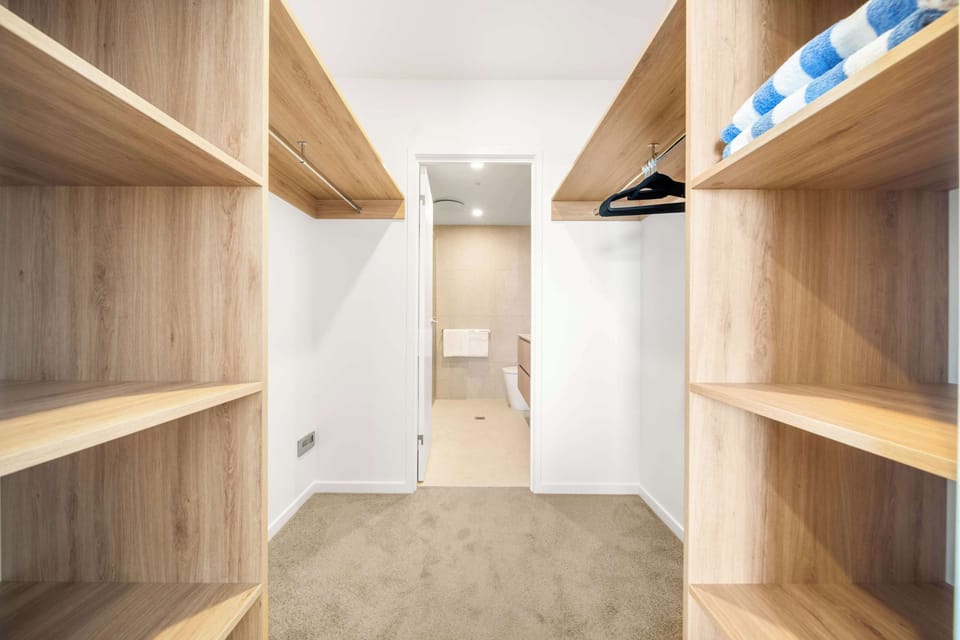 Spacious master suite with walk in wardrobe and Smart TV