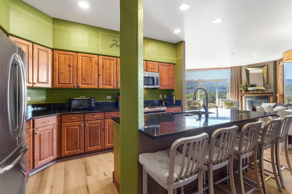 Large kitchen island with bar seating, ideal for gathering and casual meals