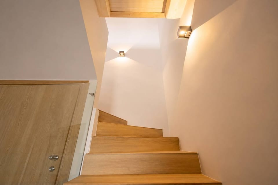 Wooden staircase connecting the two floors