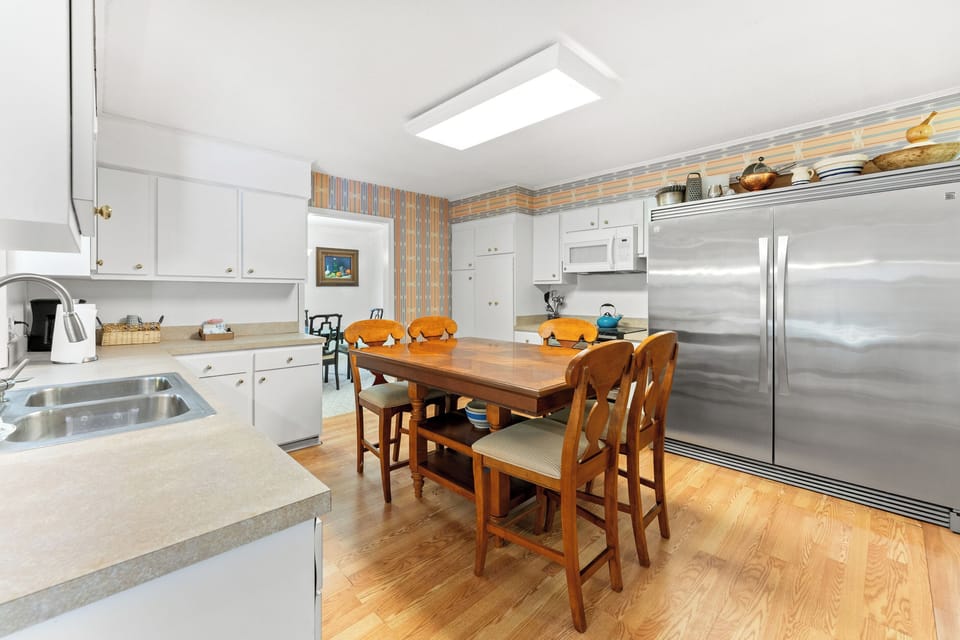 Eat in kitchen with seating for 6 and a full stocked kitchen