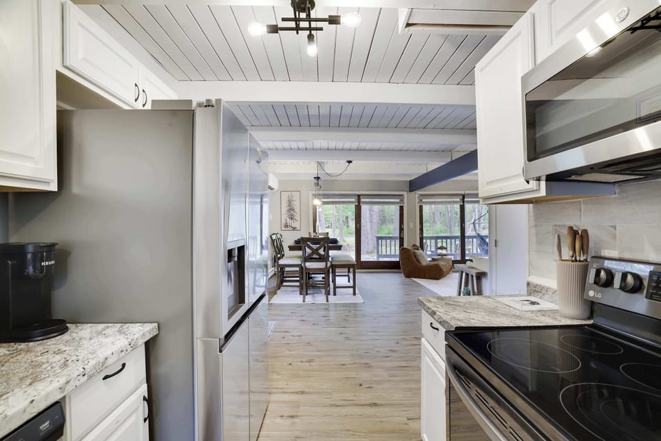 Enjoy the perfect flow from your gourmet kitchen to the open living area —a bright and inviting space designed for both effortless entertaining and relaxing family moments.