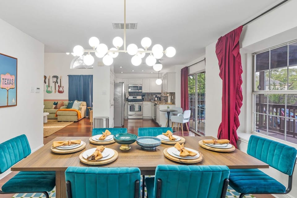 From dinner to drinks, the open layout keeps the whole group connected — dining, kitchen, and living all flow seamlessly together.