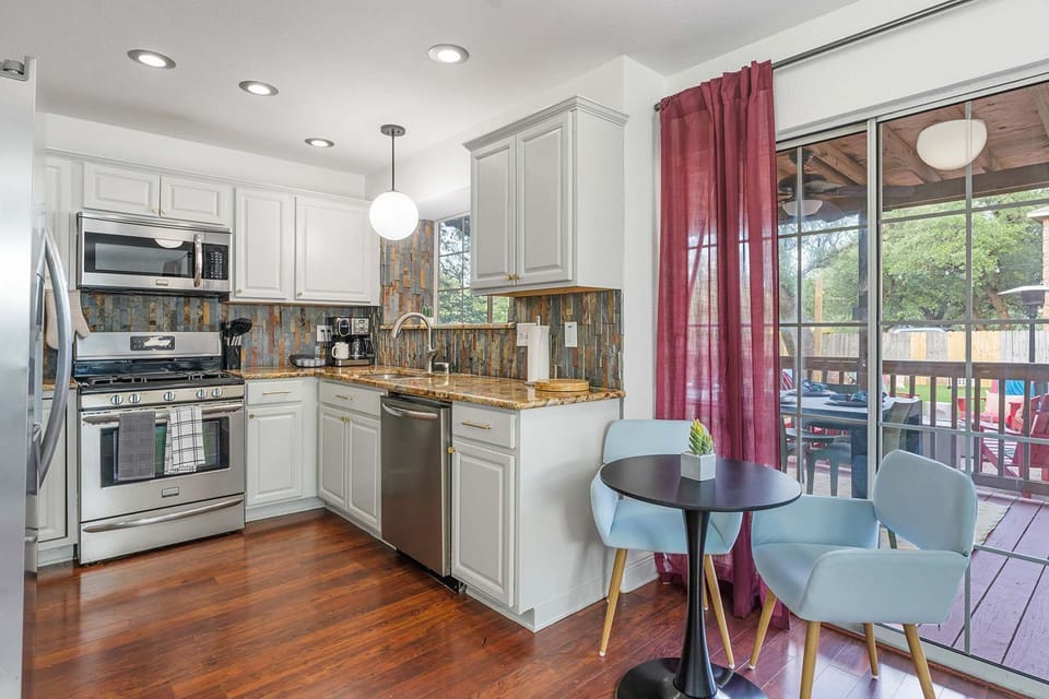 Cook in Style – This kitchen features high-end appliances, ample storage, and everything you need for a seamless culinary experience.
