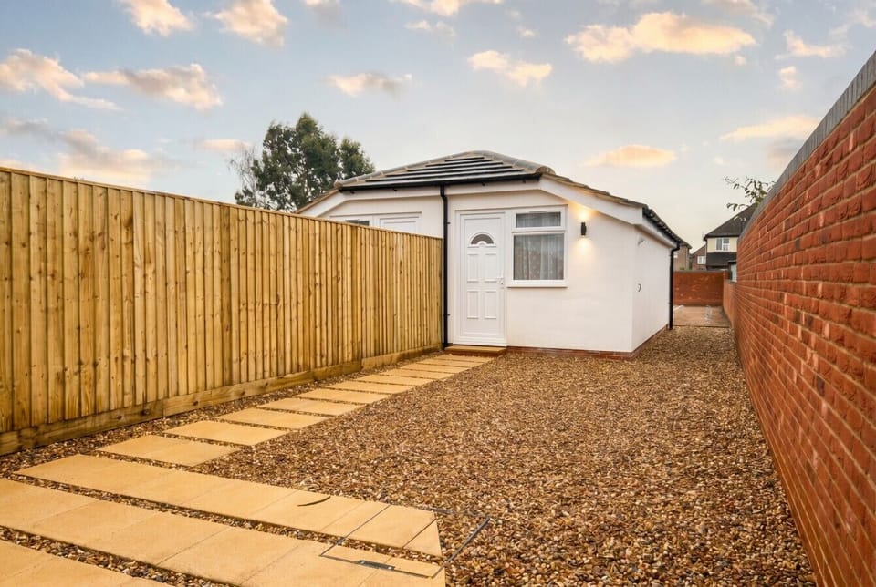 Your own private bungalow with a gated gravel garden approach