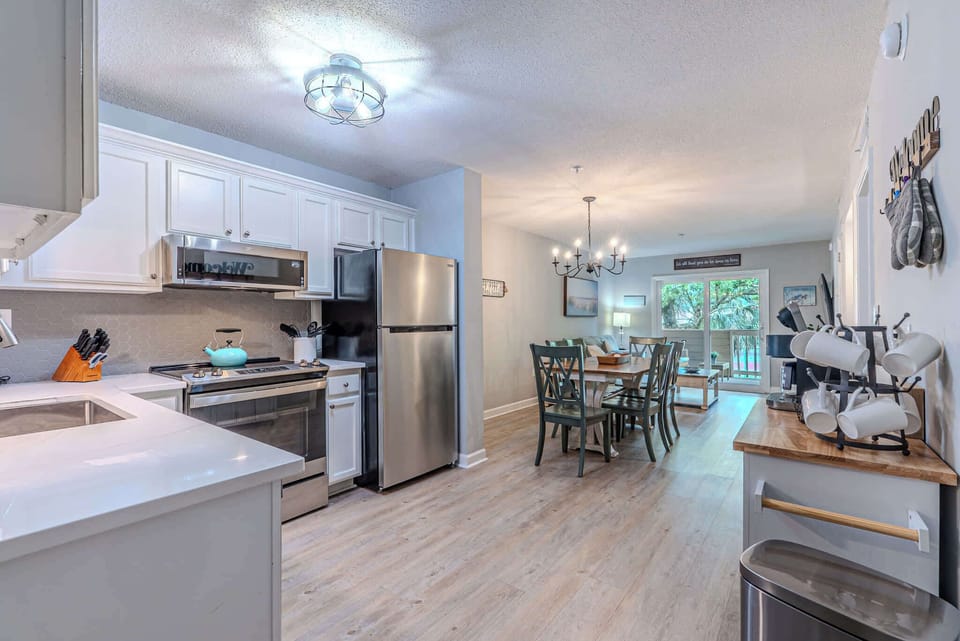 Open kitchen designed for preparing meals and gathering with family and friends!