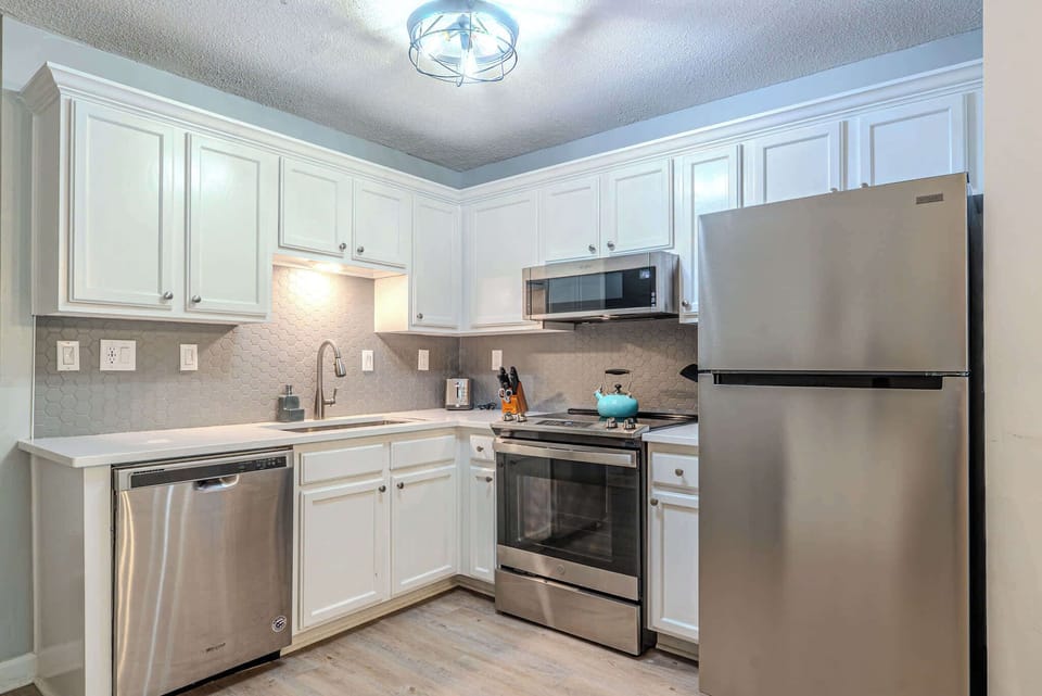 Fully equipped kitchen with modern appliances and ample counter space!