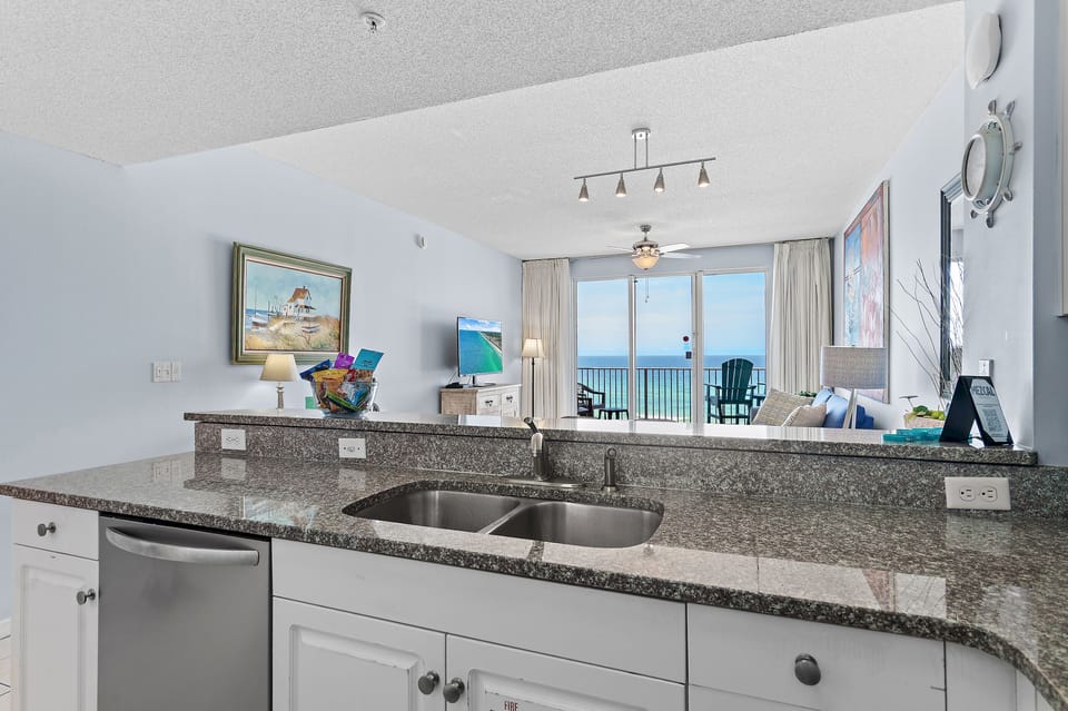 Kitchen has GULF VIEWS, granite countertops, stainless appliances - fully stocked with more than the basics (coffee/tea bar, oils/salt and pepper, plenty of pots/pans/cookware)