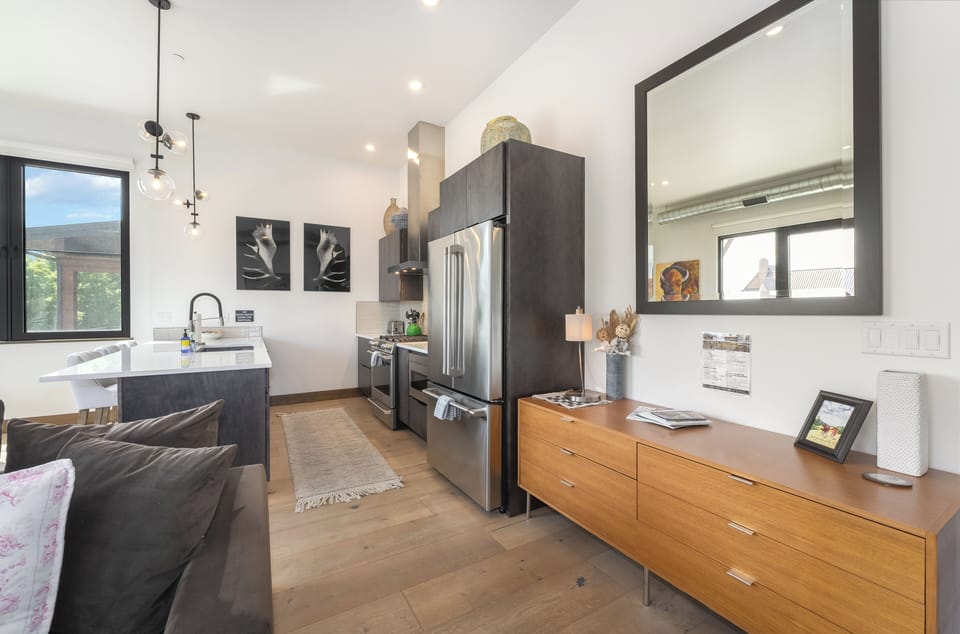 Open concept layout of living area and kitchen | Interior