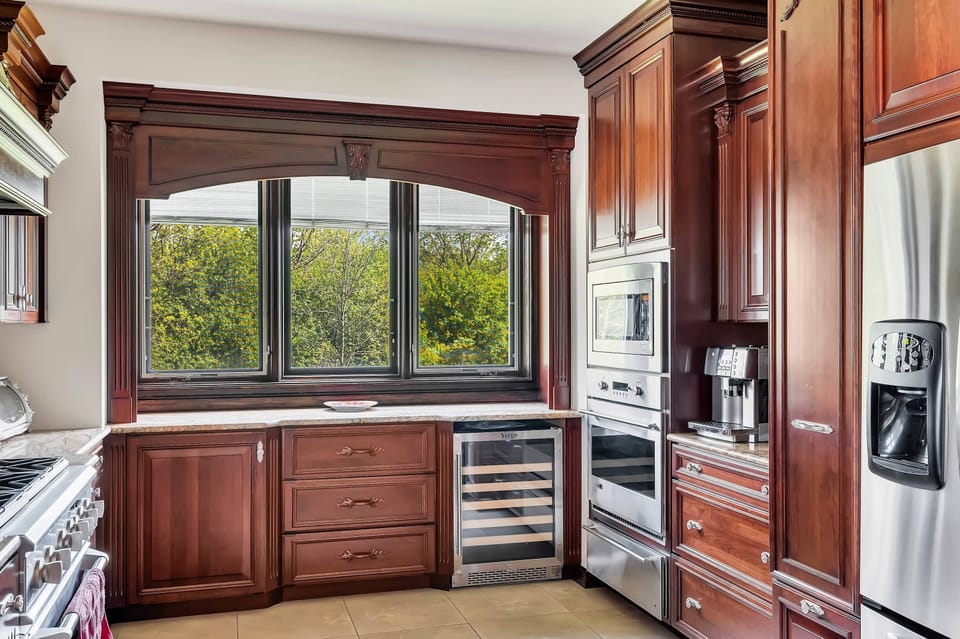 Main Level | Kitchen | Refrigerator | Double Oven | Wine Cooler | Microwave | Stove | Espresso Machine | Dishwasher