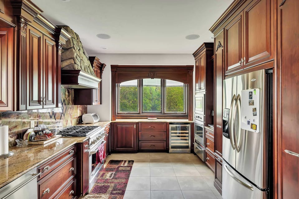 Main Level | Kitchen | Refrigerator | Double Oven | Wine Cooler | Microwave | Stove | Espresso Machine | Dishwasher | Toaster