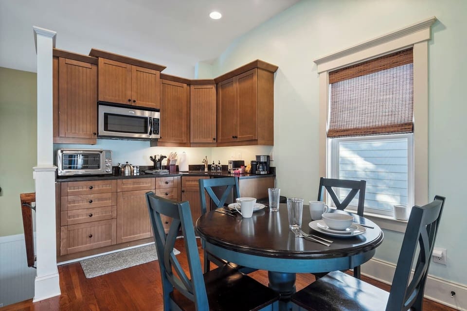 Kitchen open to the dining area — everything you need to cook and eat well